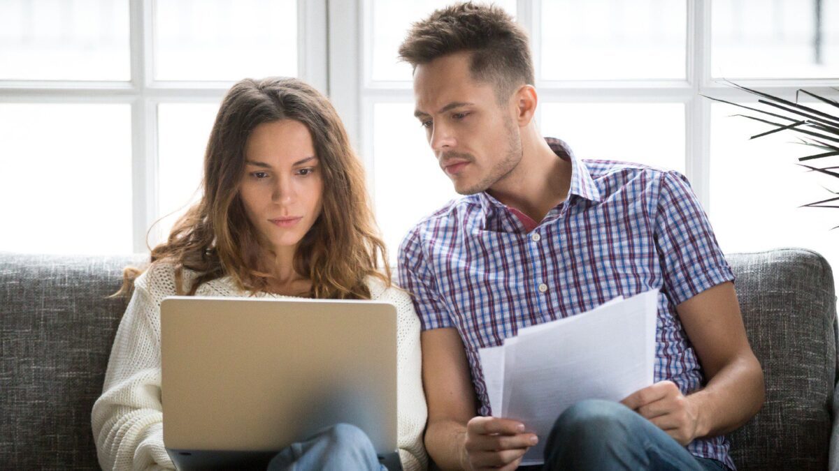 a couple applies for a loan online