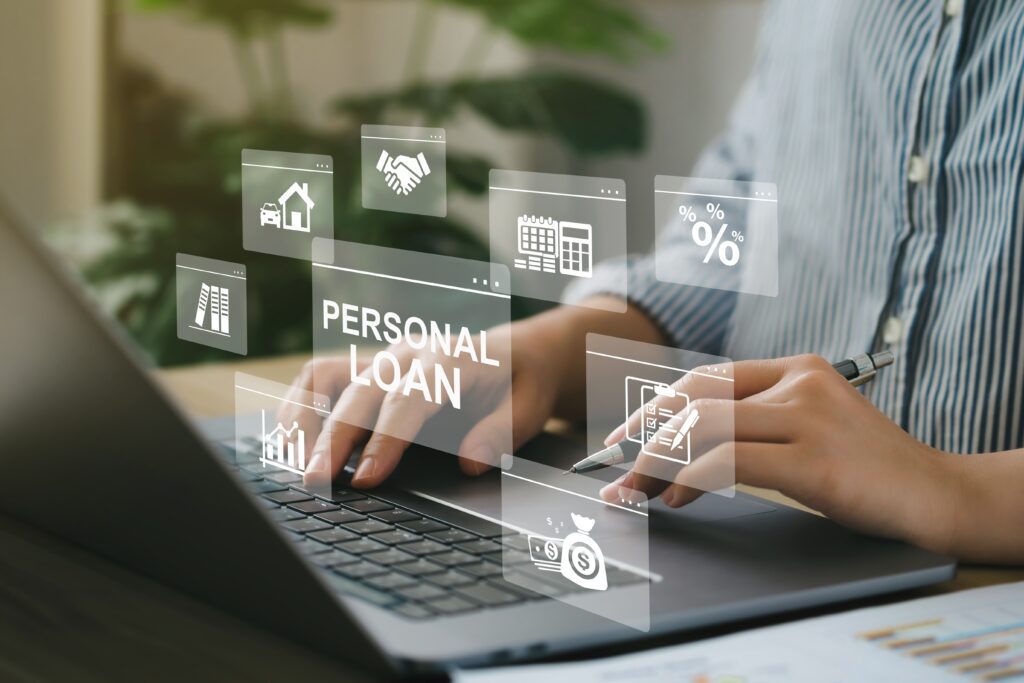 Personal loan label hovers over laptop keyboard as person types | Home repair financing
