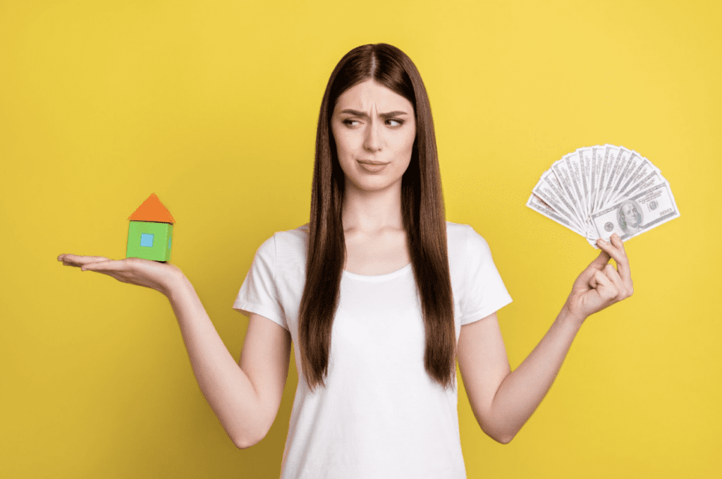 A woman weighing the pros and cons of a moving loan | How does a relocation loan work?