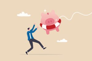 Cartoon man reaches for large piggy bank in life preserver | Best emergency loans