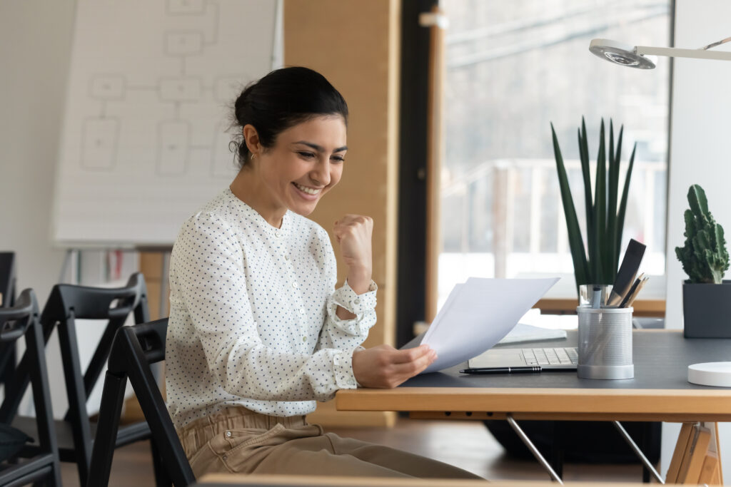 Woman smiles looking at personal loan terms after approval | 9 types of emergency loans