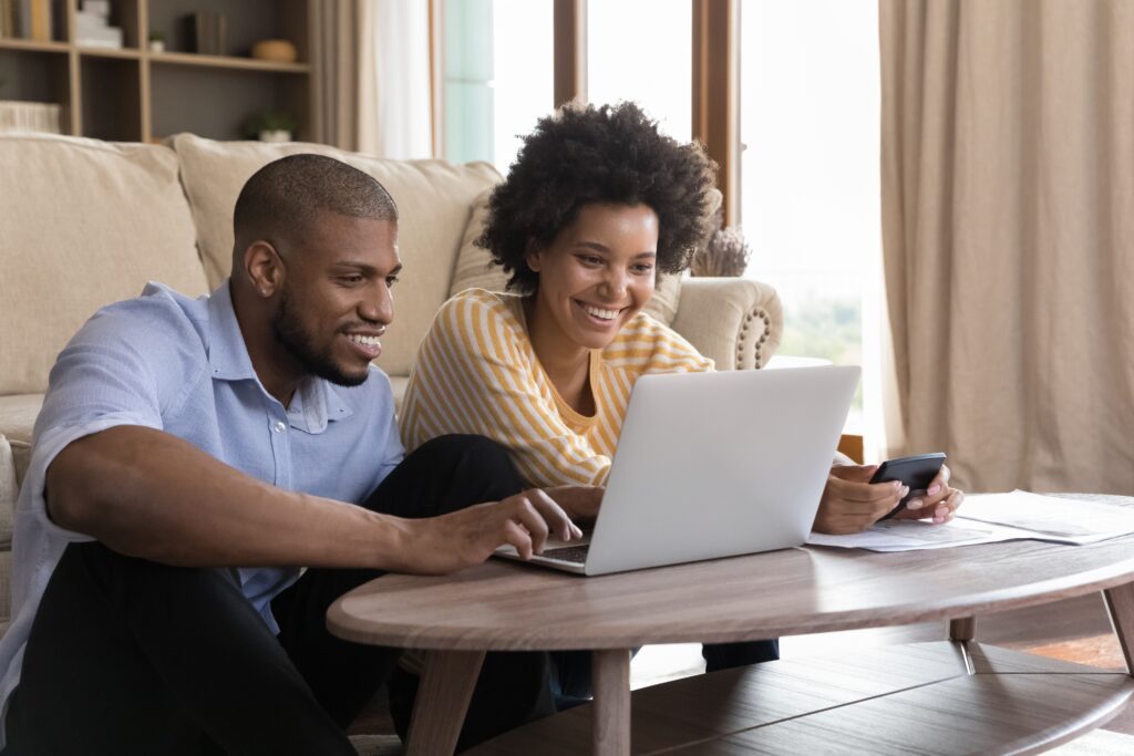 A young couple applying for a loan on a laptop | Best personal loans