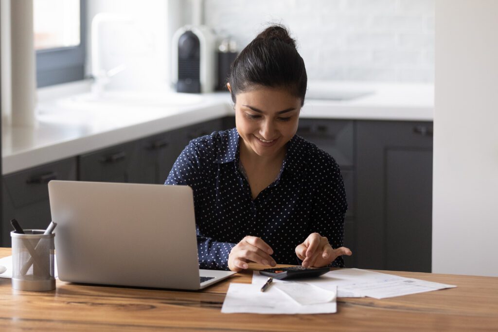 A young woman contemplating taking out a loan | Personal loan statistics